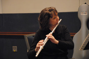 Phi Kappa Phi orchestra flutist.