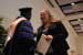Dr. Darrin Thorton congratulating 2012 Phi Kappa Phi initiate.