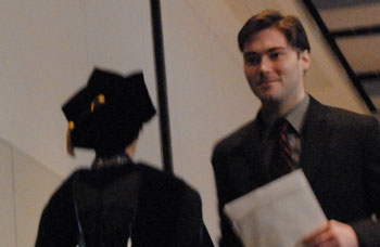 Dr. Sharon Falcone Miller congratulating 2012 Phi Kappa Phi initiate #3.